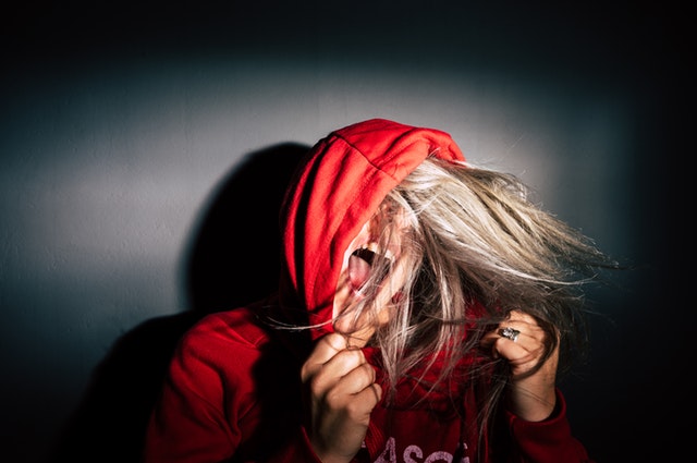 person-wearing-red-hoodie-3281130